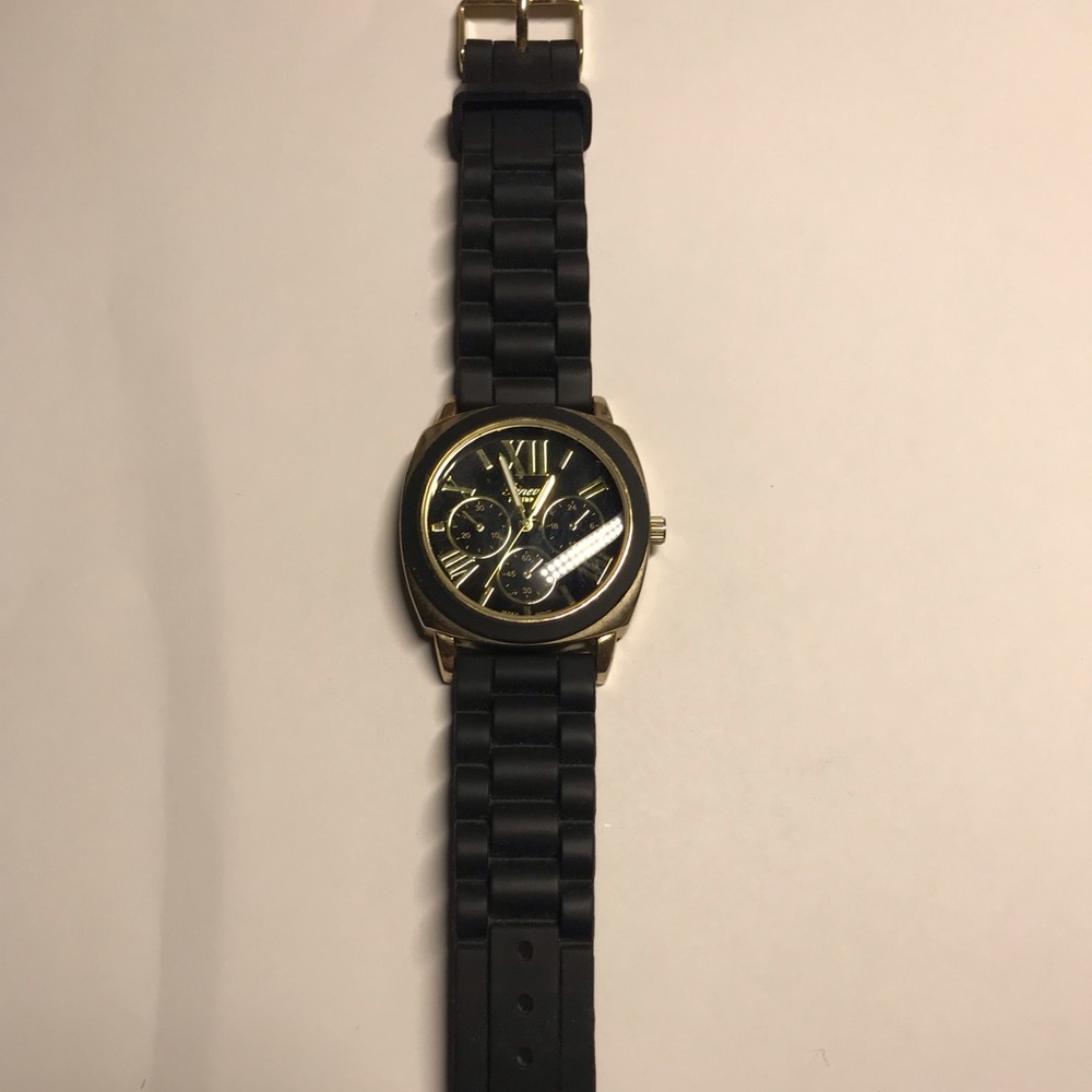 Geneva black and gold women’s watch